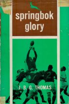Springbok glory by J B G Thomas hardback book. Some damage to dustjacket. UNSIGNED. Good