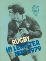 Rugby in Leinster 1879-1979 softback book. UNSIGNED. Good Condition. All autographs come with a