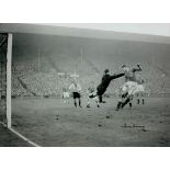 Autographed TOM FINNEY 16 x 12 Photo : B/W, depicting England winger TOM FINNEY being foiled by West