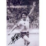 Kevin Keegan signed 7x5 inch black and white photo pictured in action for England. Good Condition.