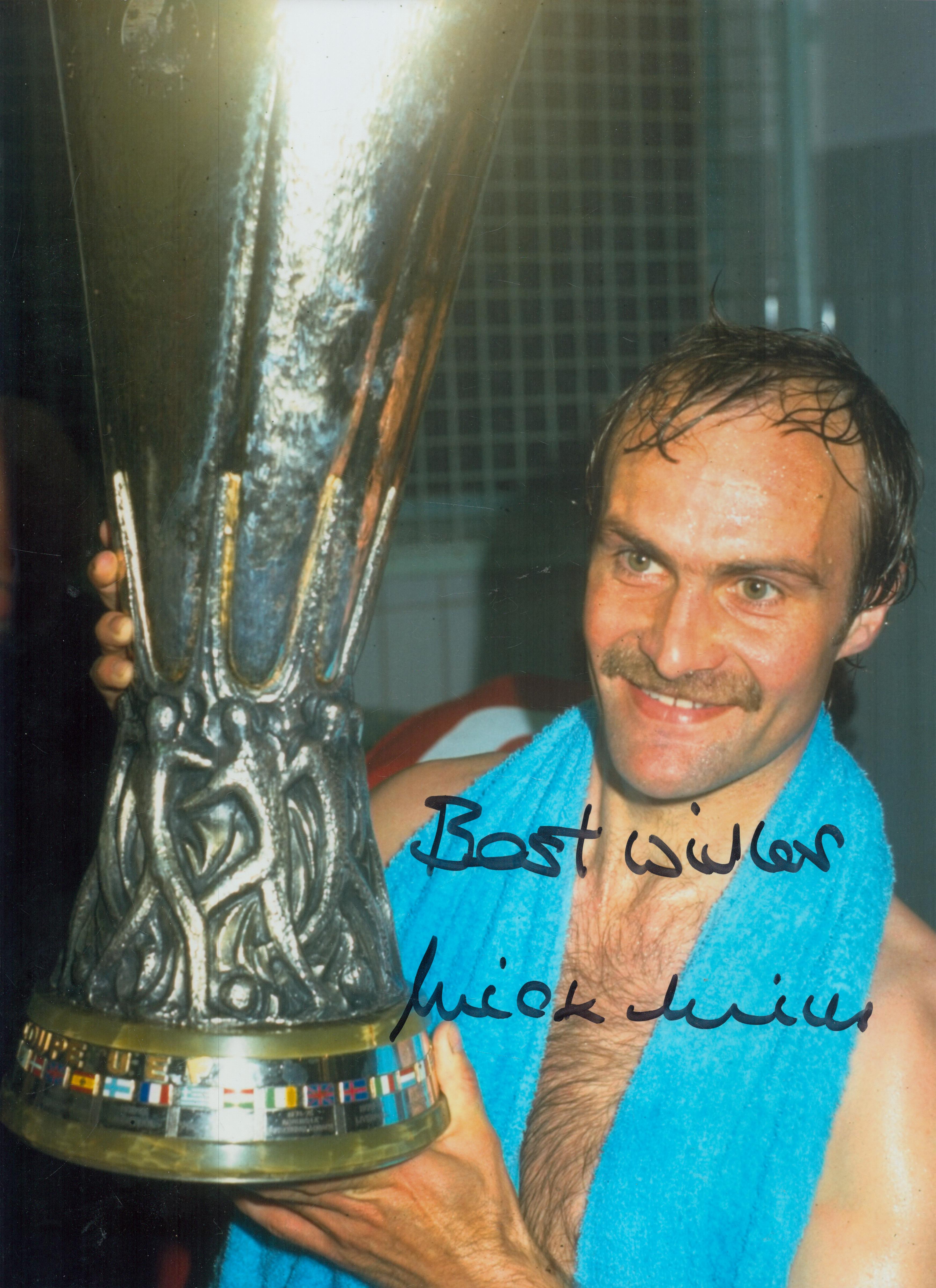 Mick Mills signed 16x12 inch colour photo pictured celebrating with the UEFA cup after Ipswich's