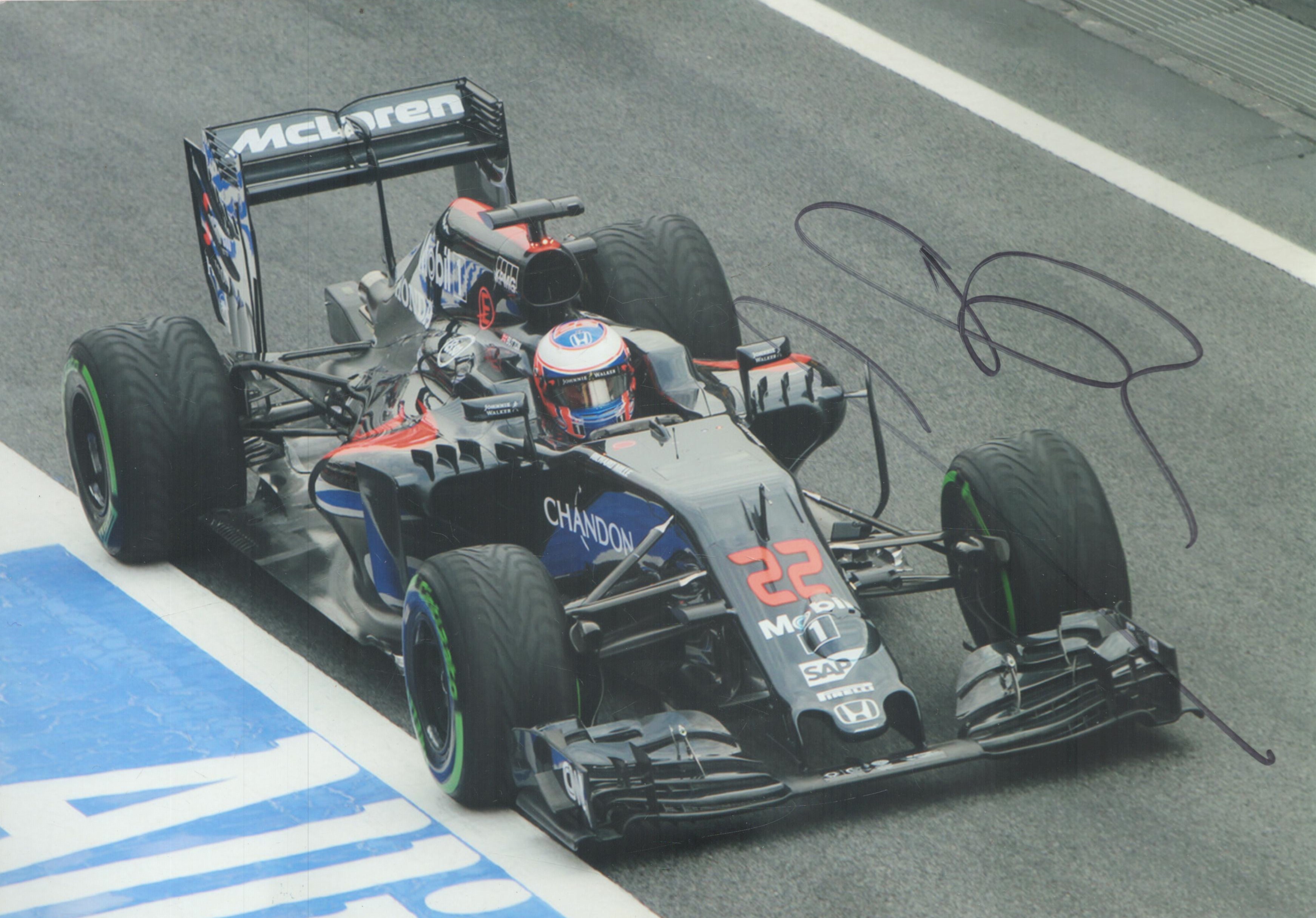 Jenson Button signed 12x8 inch colour photo pictured while driving for McLaren in Formula One.