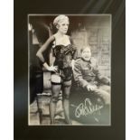 Kim Hartman and Guy Siner signed 20x16 inch Allo Allo mounted black and white photo. Good Condition.