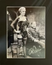 Kim Hartman and Guy Siner signed 20x16 inch Allo Allo mounted black and white photo. Good Condition.