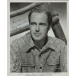 Patric Knowles signed 10x8 inch black and white Paramount pictures promo photo. Dedicated. Good