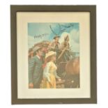 Multi signed Angela Douglas and Jim Dale colour photo "Carry on Cowboy". Mounted in Black Framed