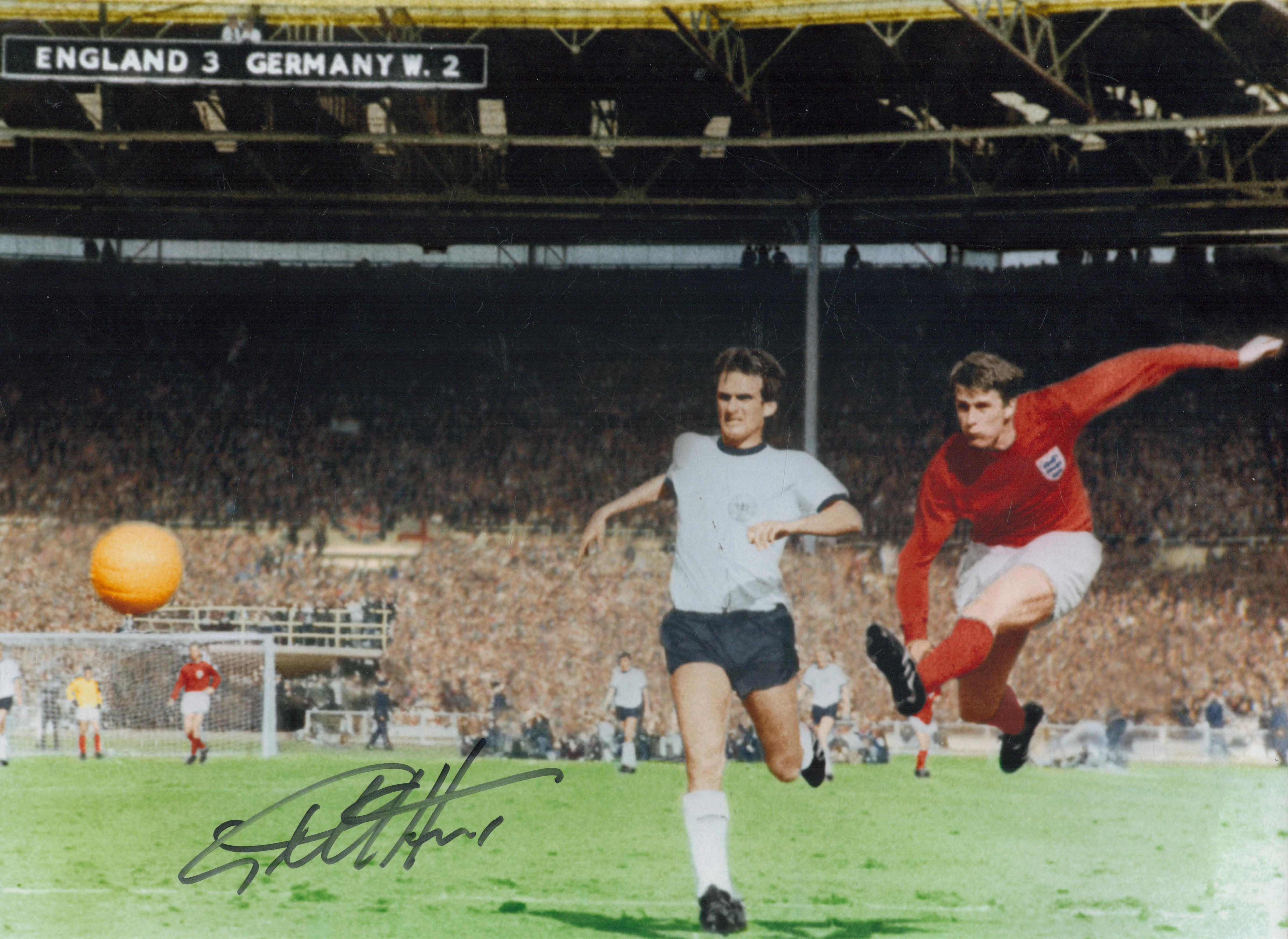 Geoff Hurst signed 16x12 inch colour photo pictured scoring his hat trick goal during the 1966 world