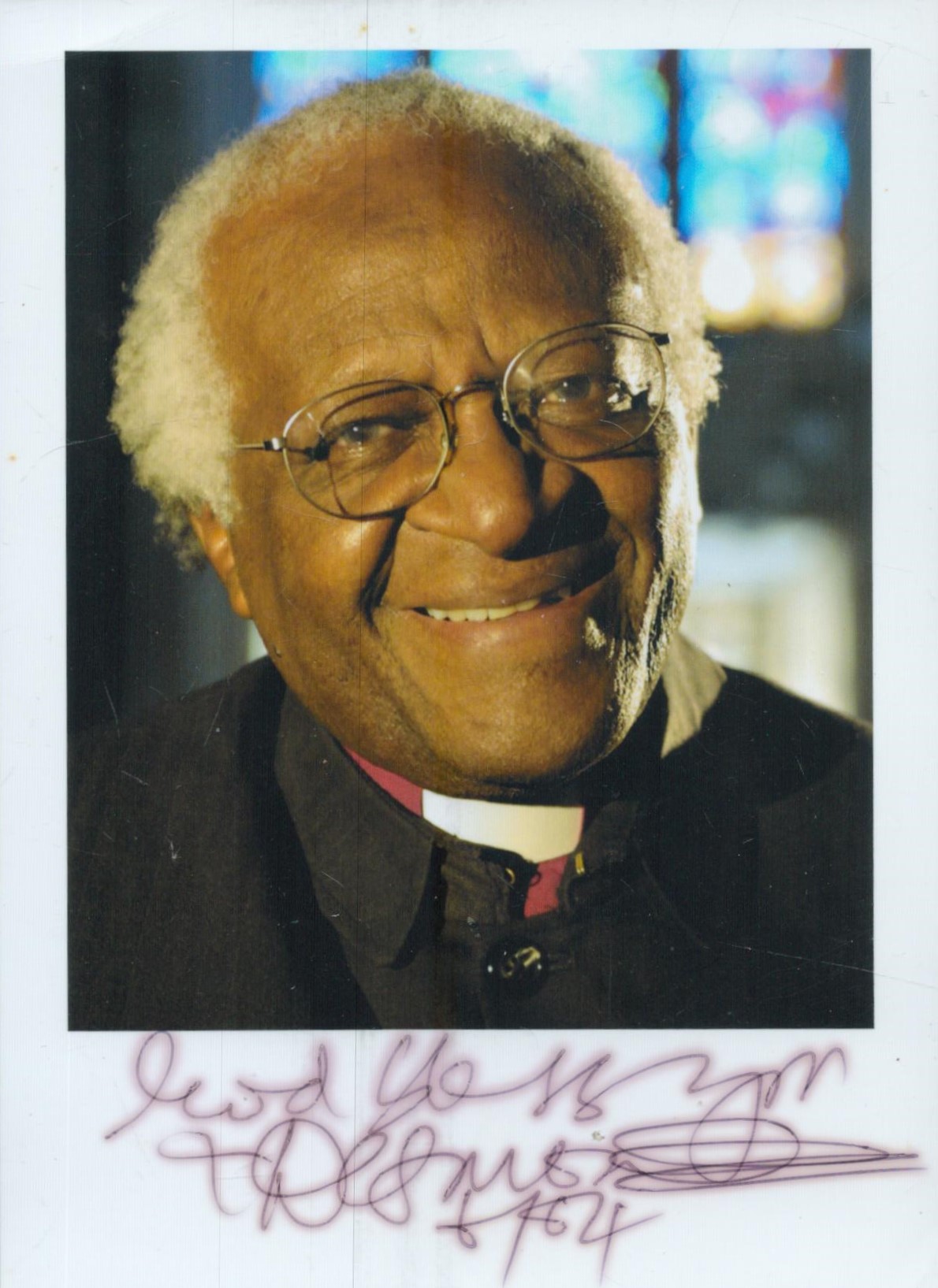 Desmond Tutu signed 6x4 inch colour photo. Good Condition. All autographs come with a Certificate of