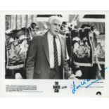 Leslie Nielsen signed 10x8 inch Naked Gun black and white movie still photo. Good Condition. All