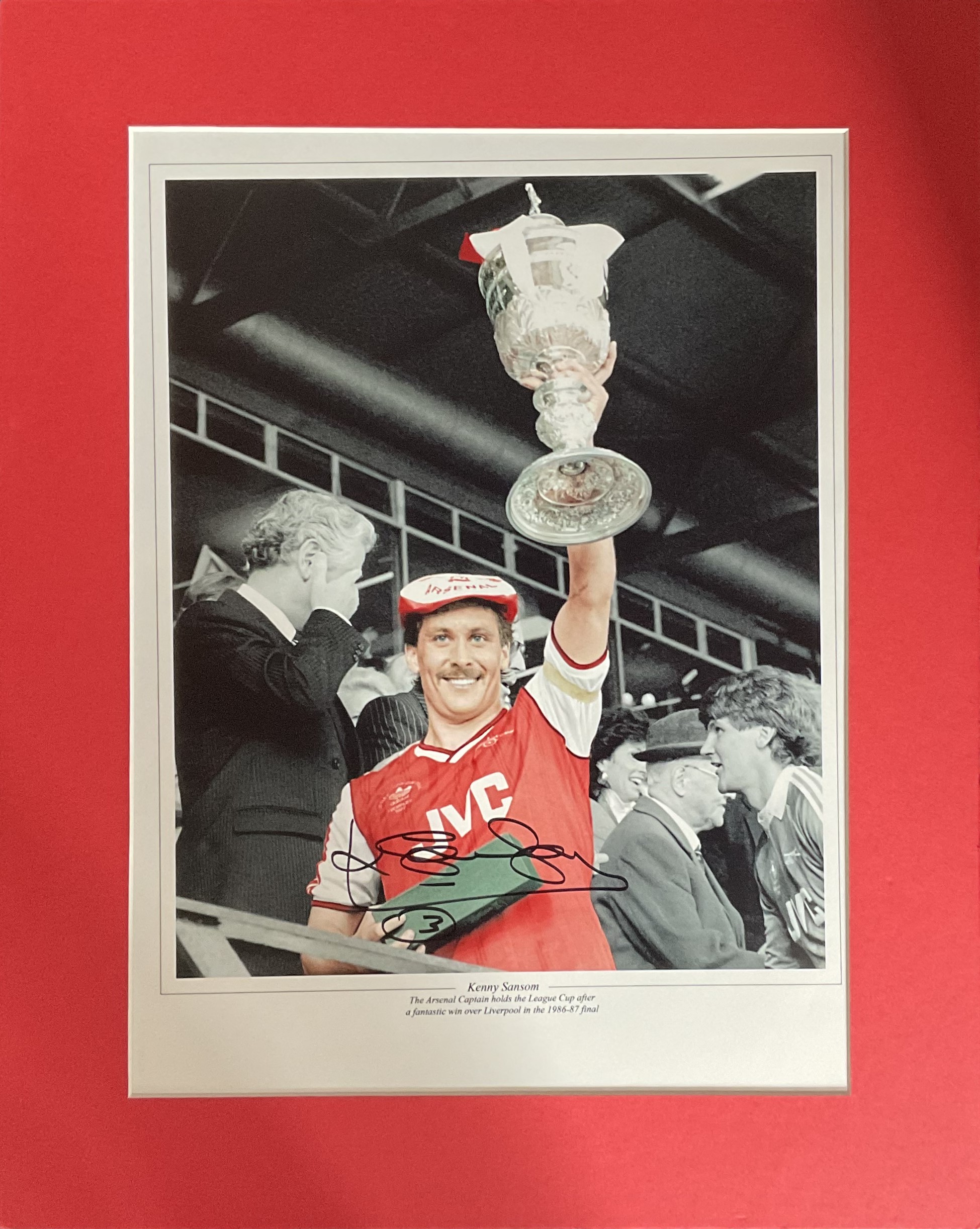 Kenny Sansom signed 20x16 inch mounted colourised print pictured with the League Cup after the