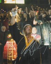 Sylvester Stallone signed 12x8 inch Rocky Balboa colour photo. Good Condition. All autographs come
