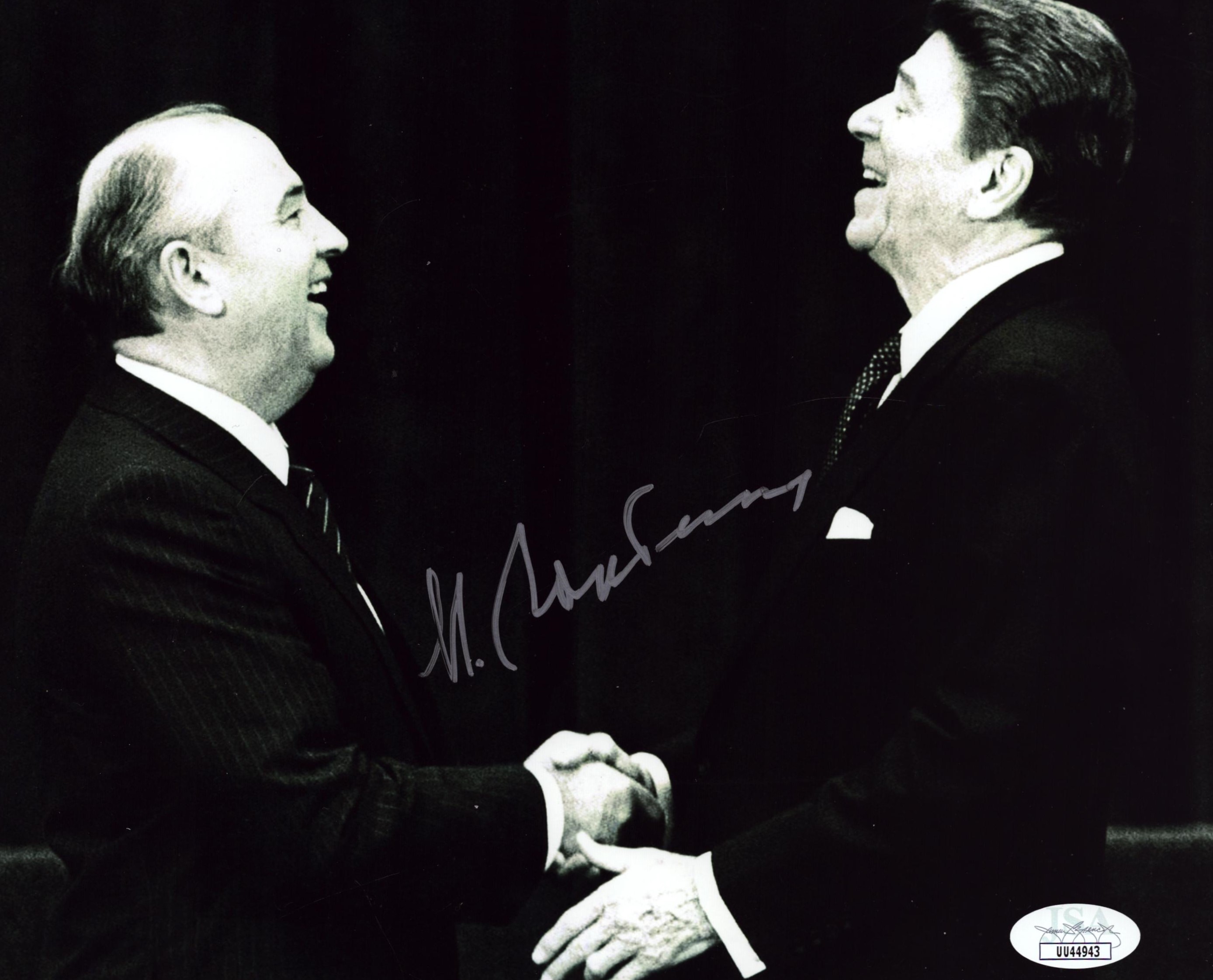 Mikhael Gorbachev signed 10x8 inch black and white photo pictured with Ronald Reagan. Good