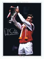 Autographed ALAN SMITH 16 x 12 Photo-Edition : Col, depicting Arsenal centre-forward ALAN SMITH