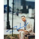Tom Hanks signed 10x8 inch Forest Gump colour photo. Good Condition. All autographs come with a