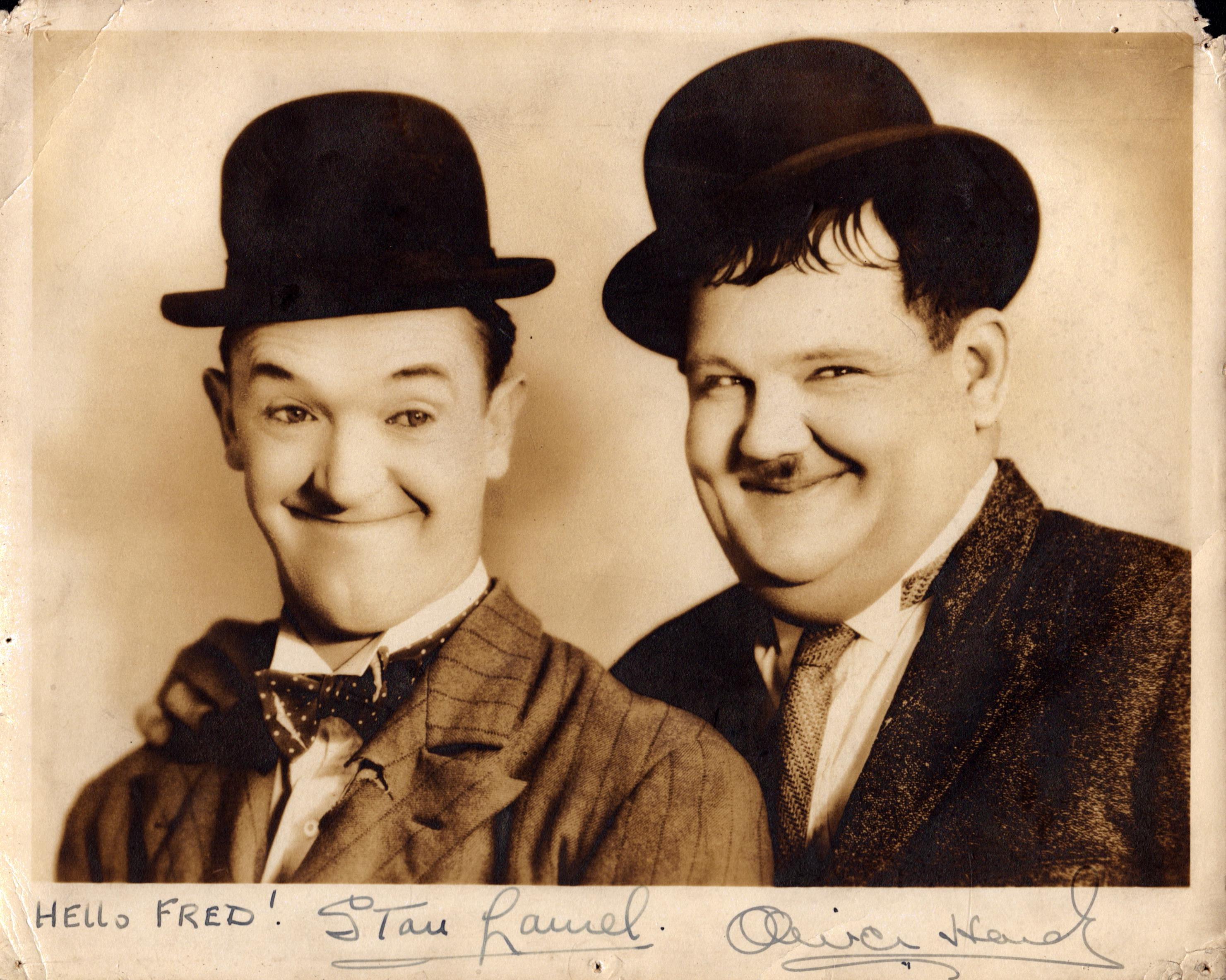 Laurel and Hardy signed 10x8 inch vintage sepia photo inscribed Hello Fred ! Stan Laurel, Oliver