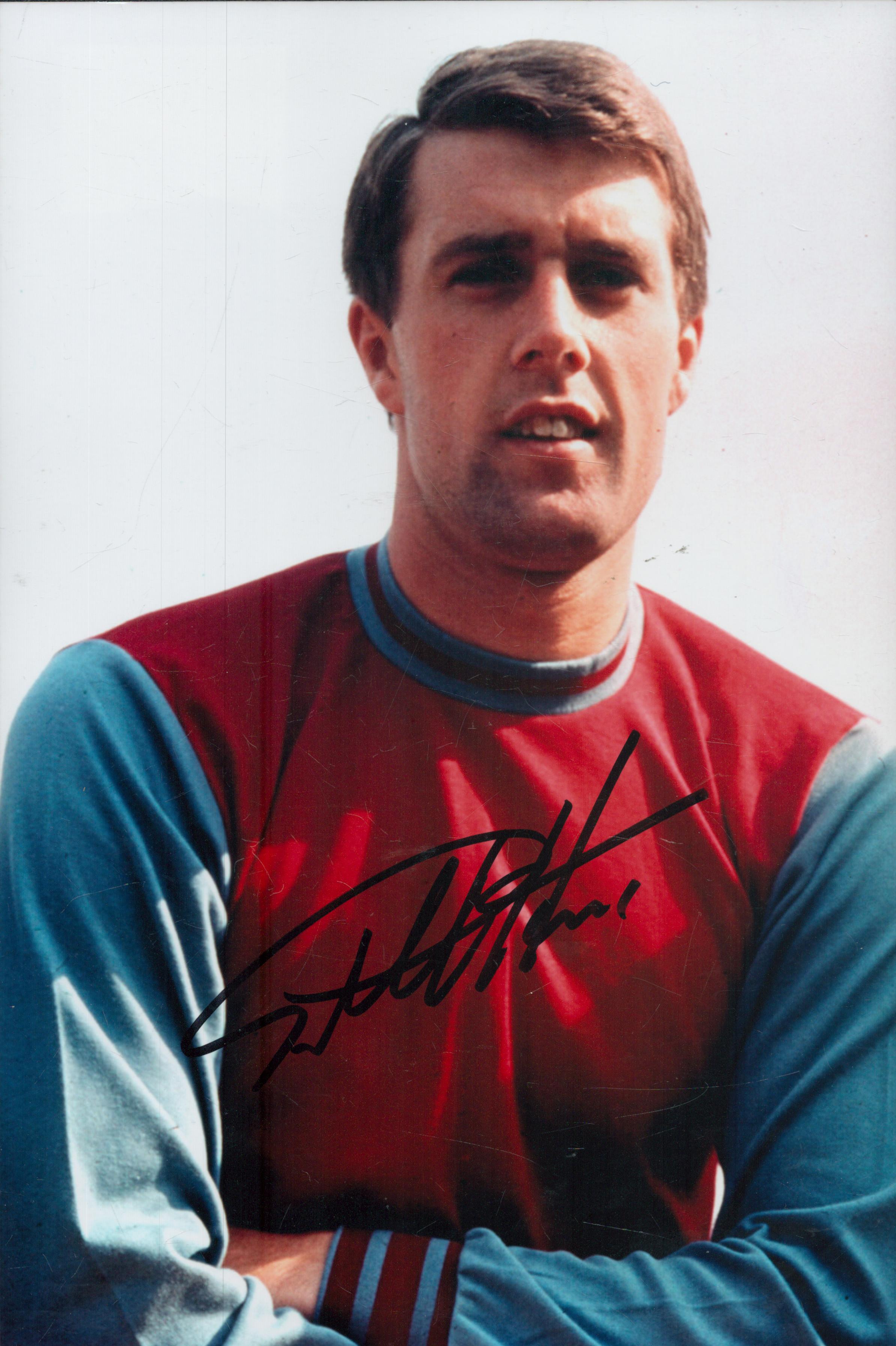 Geoff Hurst signed 12x8 inch West Ham United colour photo. Good Condition. All autographs come