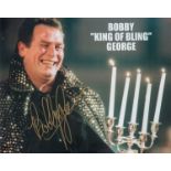 Bobby George signed 10x8 inch "King of Bling" colour promo photo. Good Condition. All autographs