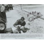 Oliver Reed signed 10x8inch black and white movie still from The End of the Road. Good Condition.