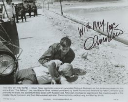 Oliver Reed signed 10x8inch black and white movie still from The End of the Road. Good Condition.