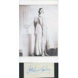 Josephine Baker signed 4x2 inch album page cutting and 8x6 inch black and white photo. Good