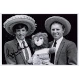 Marin Peters signed 12x8 inch black and white photo pictured with Bobby Moore. Good Condition. All