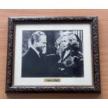 Virginia Mayo signed mounted and framed black and white photo. With gold name plaque below. Measures