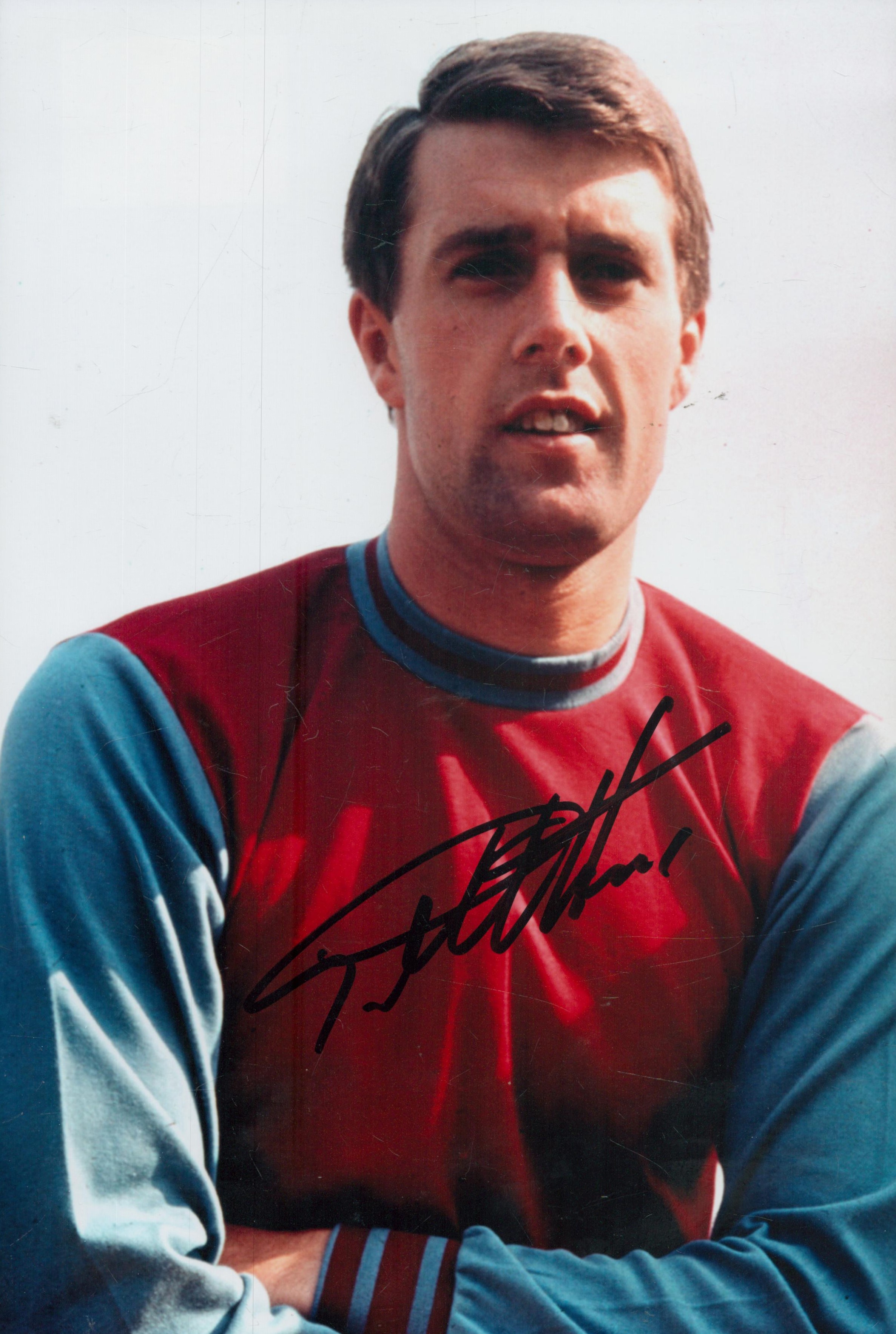 Geoff Hurst signed 12x8 inch West Ham United colour photo. Good Condition. All autographs come