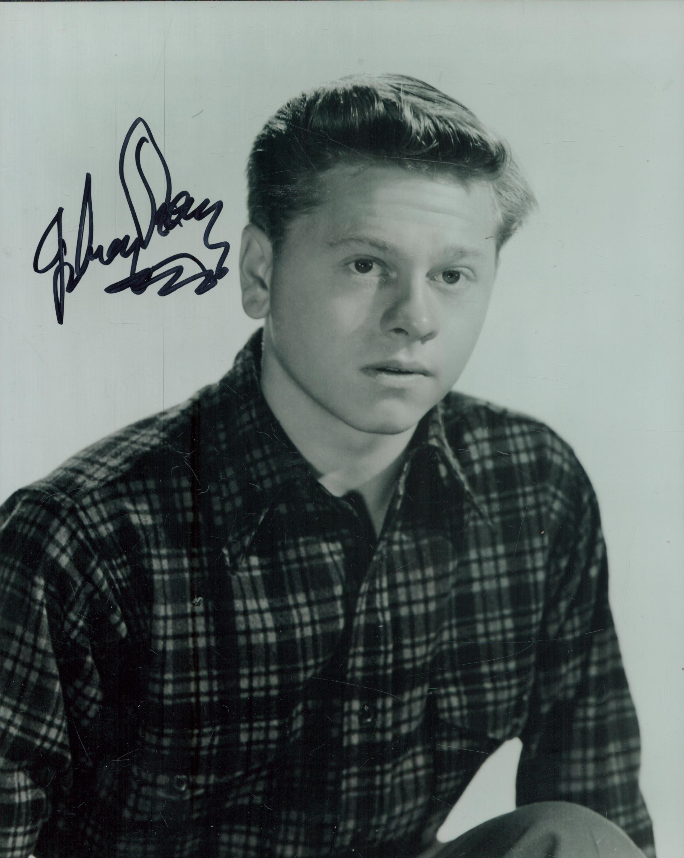 Mickey Rooney signed 10x8 inch black and white photo. Good Condition. All autographs come with a