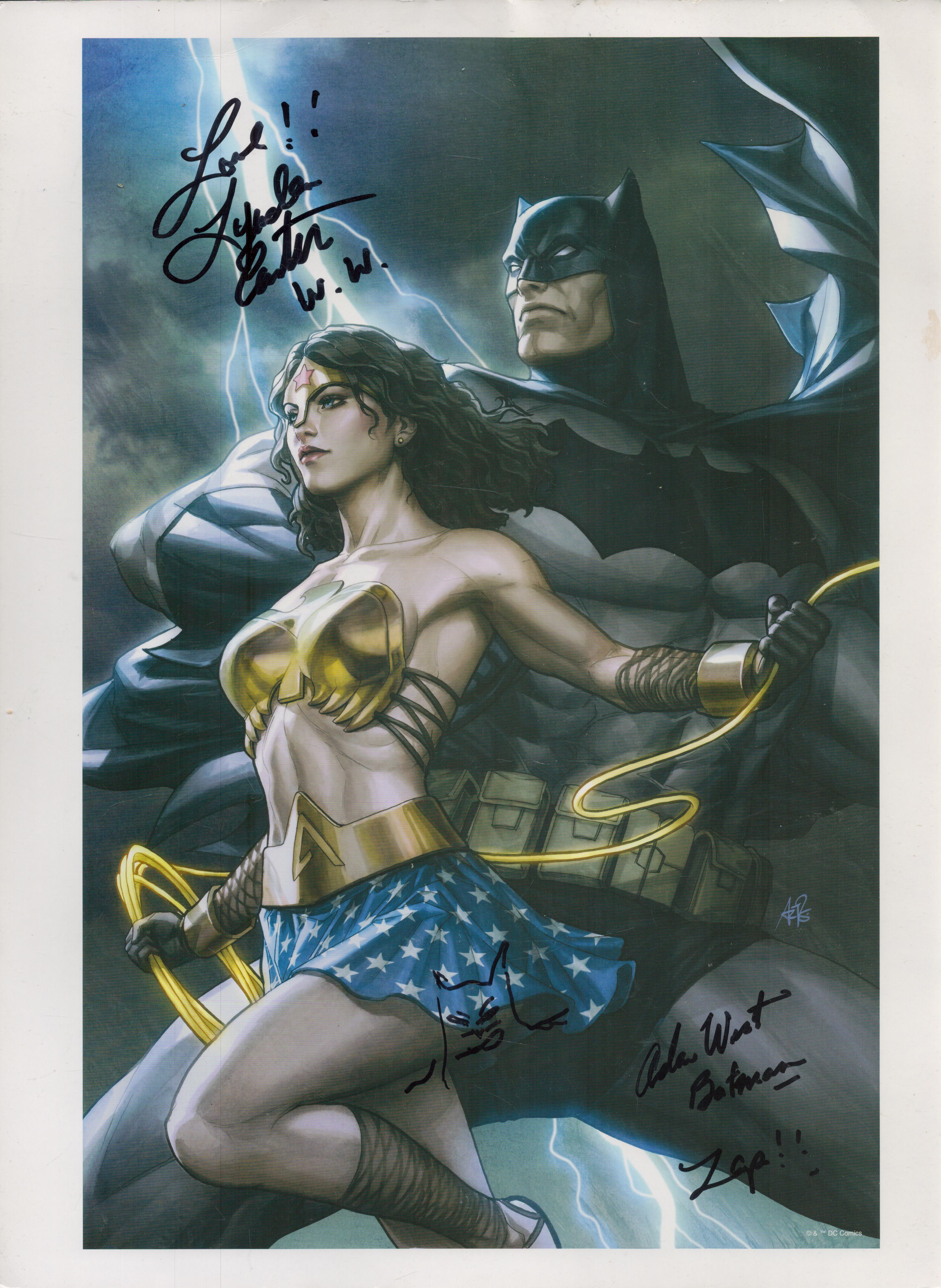 Adam West and Lynda Carter signed Batman and Wonder Woman 16x12 inch colour print illustration. Good