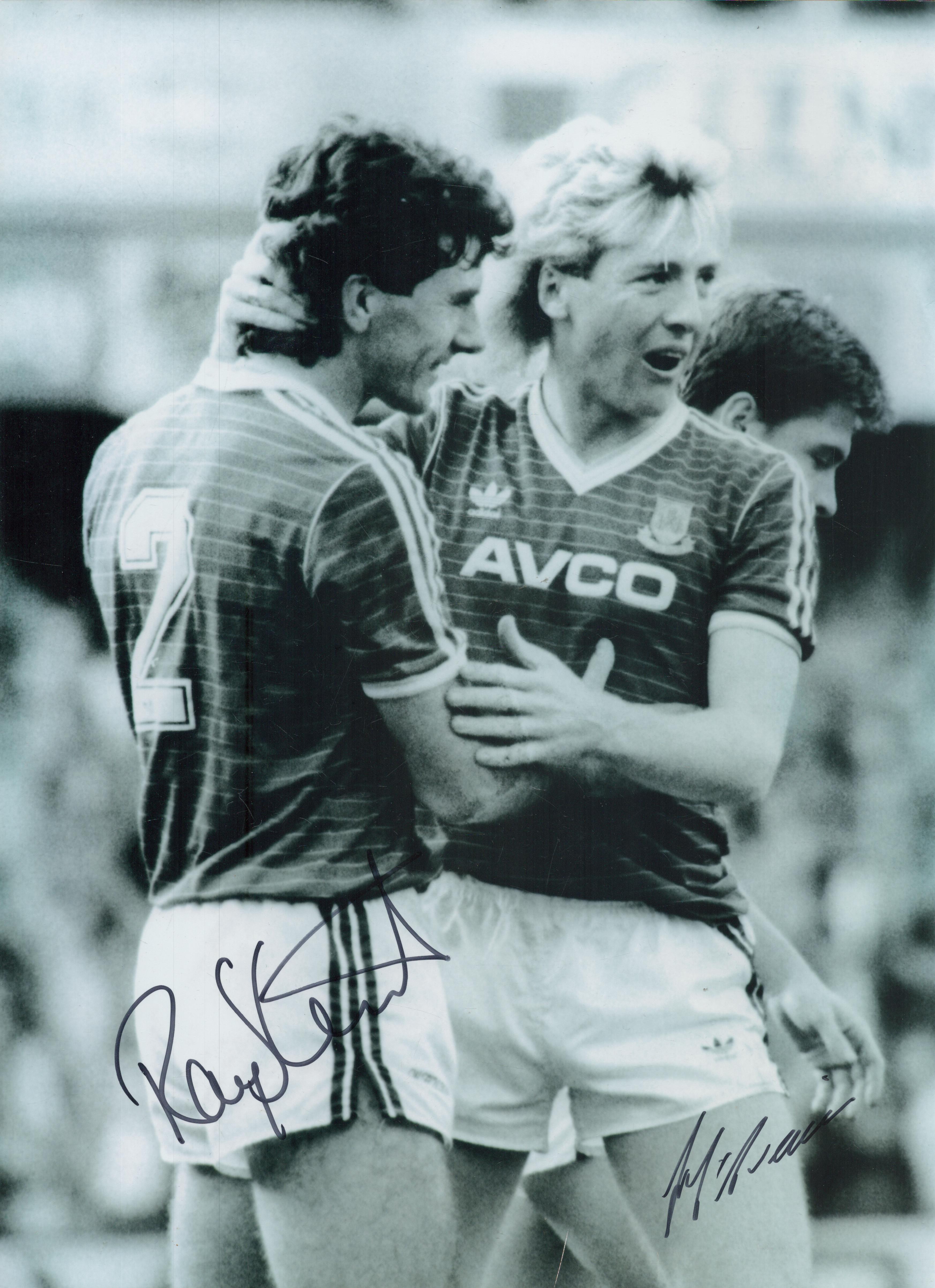 Ray Stewart and Frank McAvennie signed 16x12 inch black and white photo pictured in action for