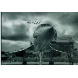 Concorde early pilot Capt Harry Linfield signed stunning 12 x 8 b/w photo. Concorde pilot Captain