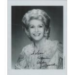 Debbie Reynolds signed 10x8 inch black and white photo dedicated. Good condition Est.