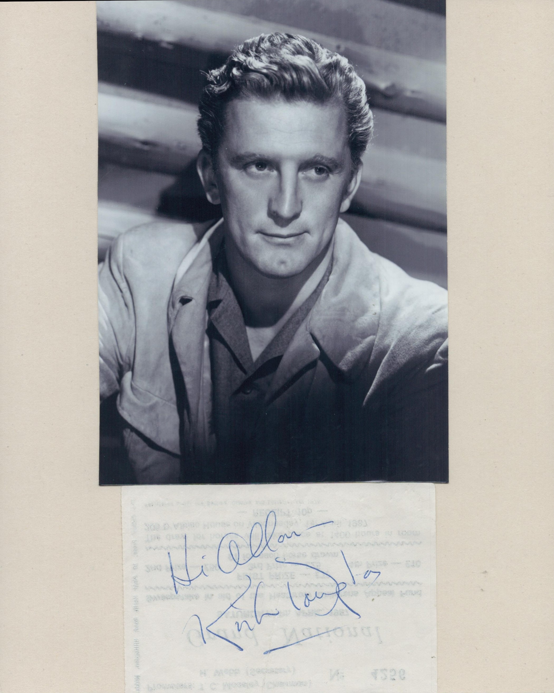 Kirk Douglas signed 5x3 page and 7x5 inch vintage black and white photo. Good condition Est.