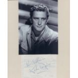 Kirk Douglas signed 5x3 page and 7x5 inch vintage black and white photo. Good condition Est.