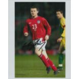 Wayne Rooney signed 10x8 inch colour photo pictured in action for England. Good condition Est.