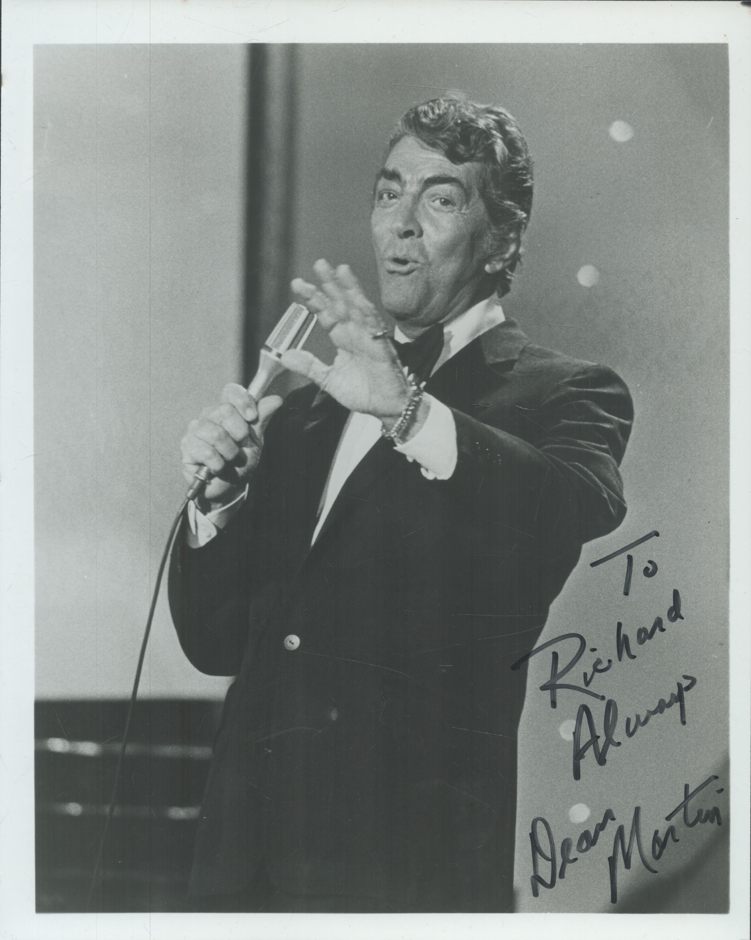 Dean Martin signed 10x8 inch black and white photo dedicated. Good Condition. All autographs come