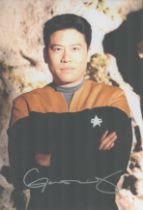 Garrett Wang signed 12x8 inch Star Trek colour photo. Good Condition. All autographs come with a