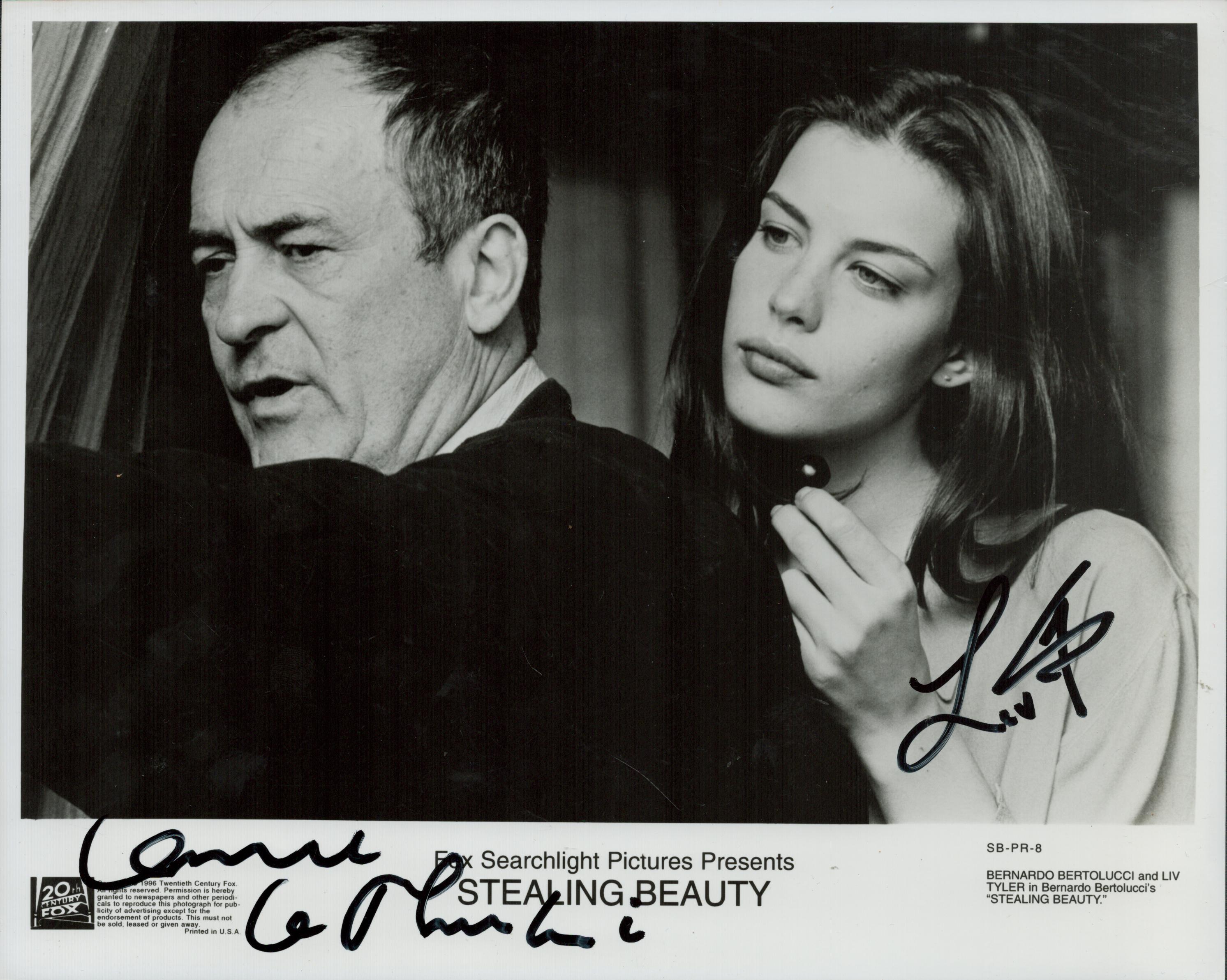 Multi signed Bernardo Bertolucci and Liv Tyler Black and White Still Movie Photo 10x8 Inch. '