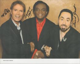 Cliff Richard ,Lamont Dozier and David Guest signed 10x8 inch colour photo. Good Condition. All