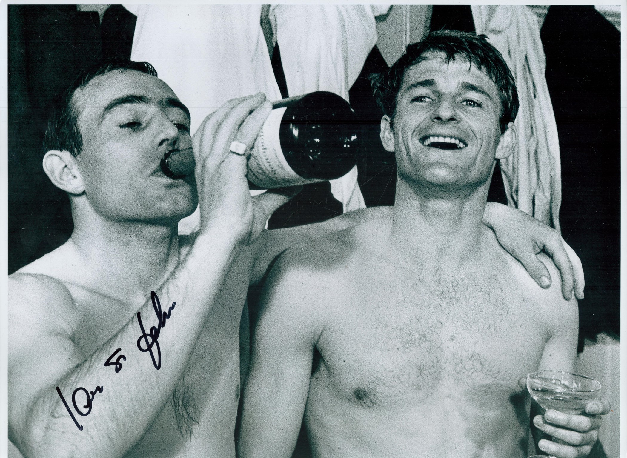 Ian St John Signed 16 x 12 inch Black and White Glossy Photo Pictured Drinking Champagne. Signed