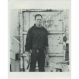 Fred Dryer signed 10x8 inch black and white photo. Good Condition. All autographs come with a