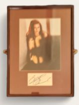 Belinda Carlisle signature piece with colour photo. Framed. Measures 12 inch by 16-inch appx. Good