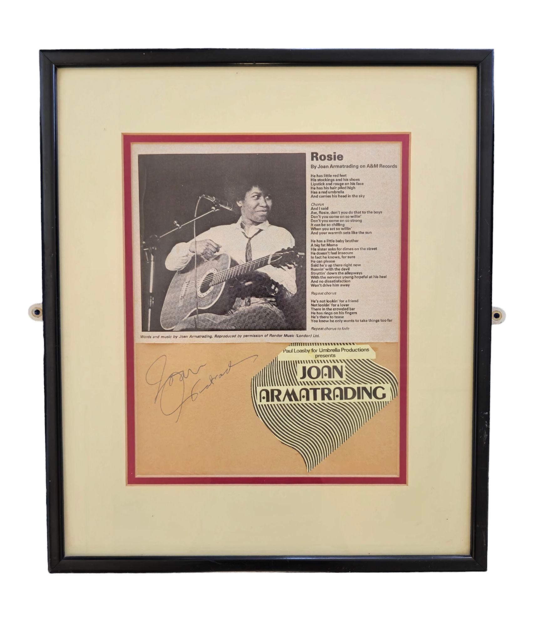 Joan Armatrading signature piece with black and white newspaper cut out photo with song lyrics