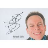 Warwick Davis signed 6x4 inch colour promo photo. Good Condition. All autographs come with a