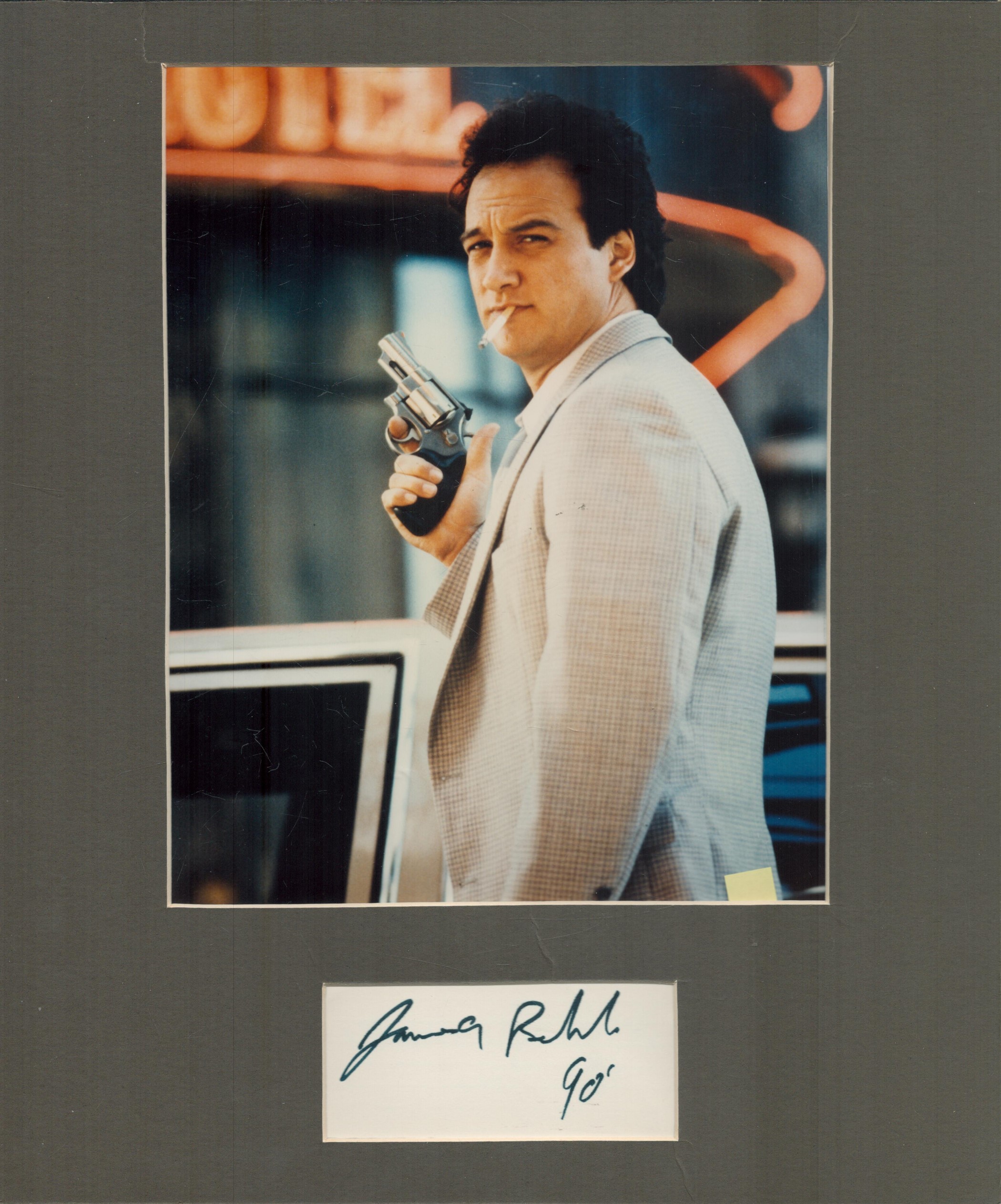 James Belushi mounted signature piece with colour photo. Measures 14x12 inch appx. Good Condition.