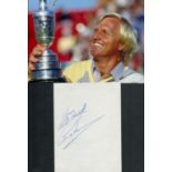 GREG NORMAN signed page with Golf British Open Photo . Good Condition. All autographs come with a