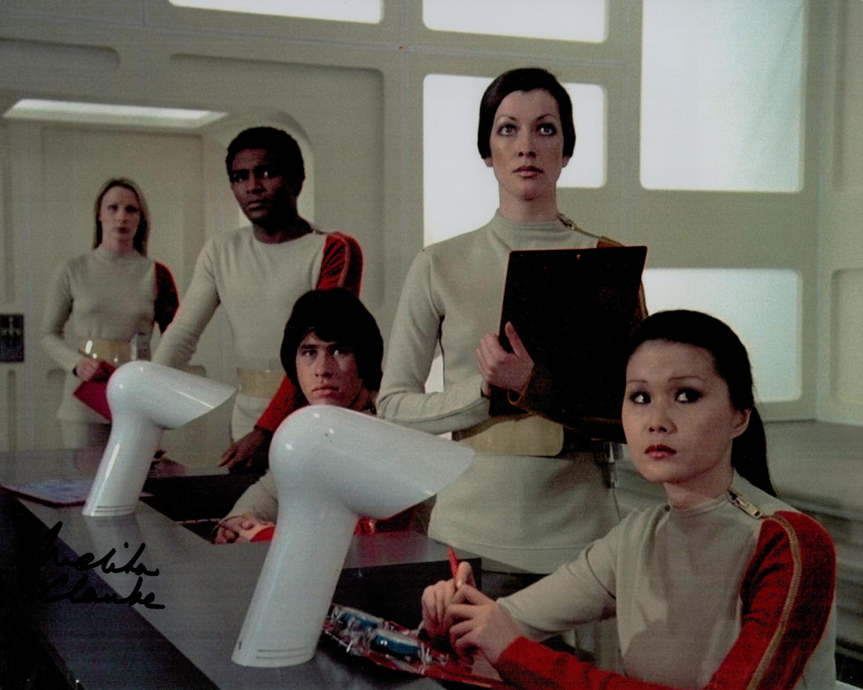 Melta Clarke signed 10x8 inch Space 1999 colour photo. Good Condition. All autographs come with a