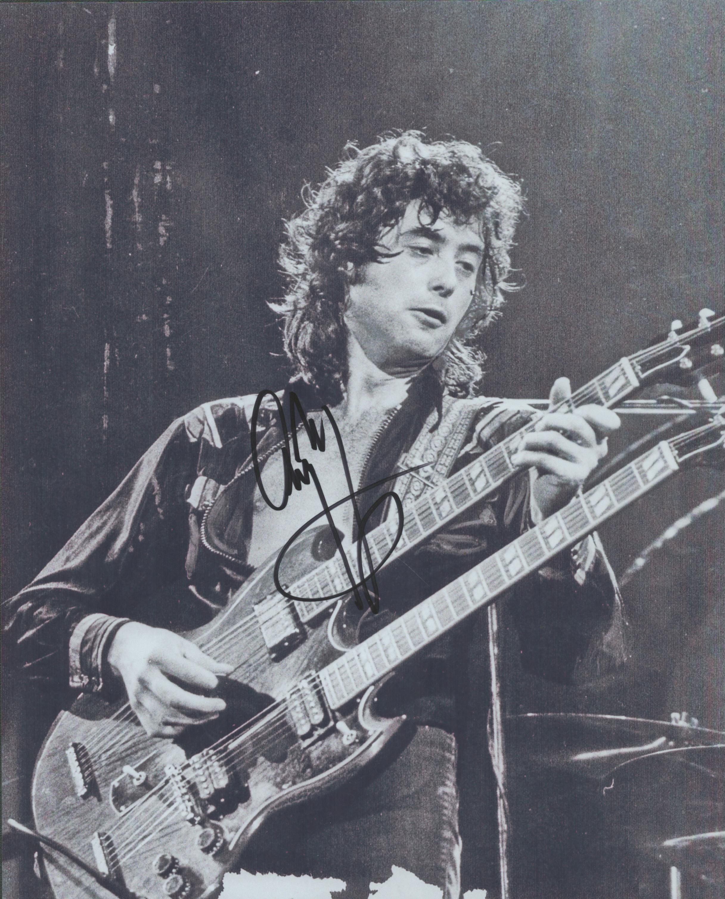 Jimmy Page signed 10x8 inch black and white photo. Good Condition. All autographs come with a