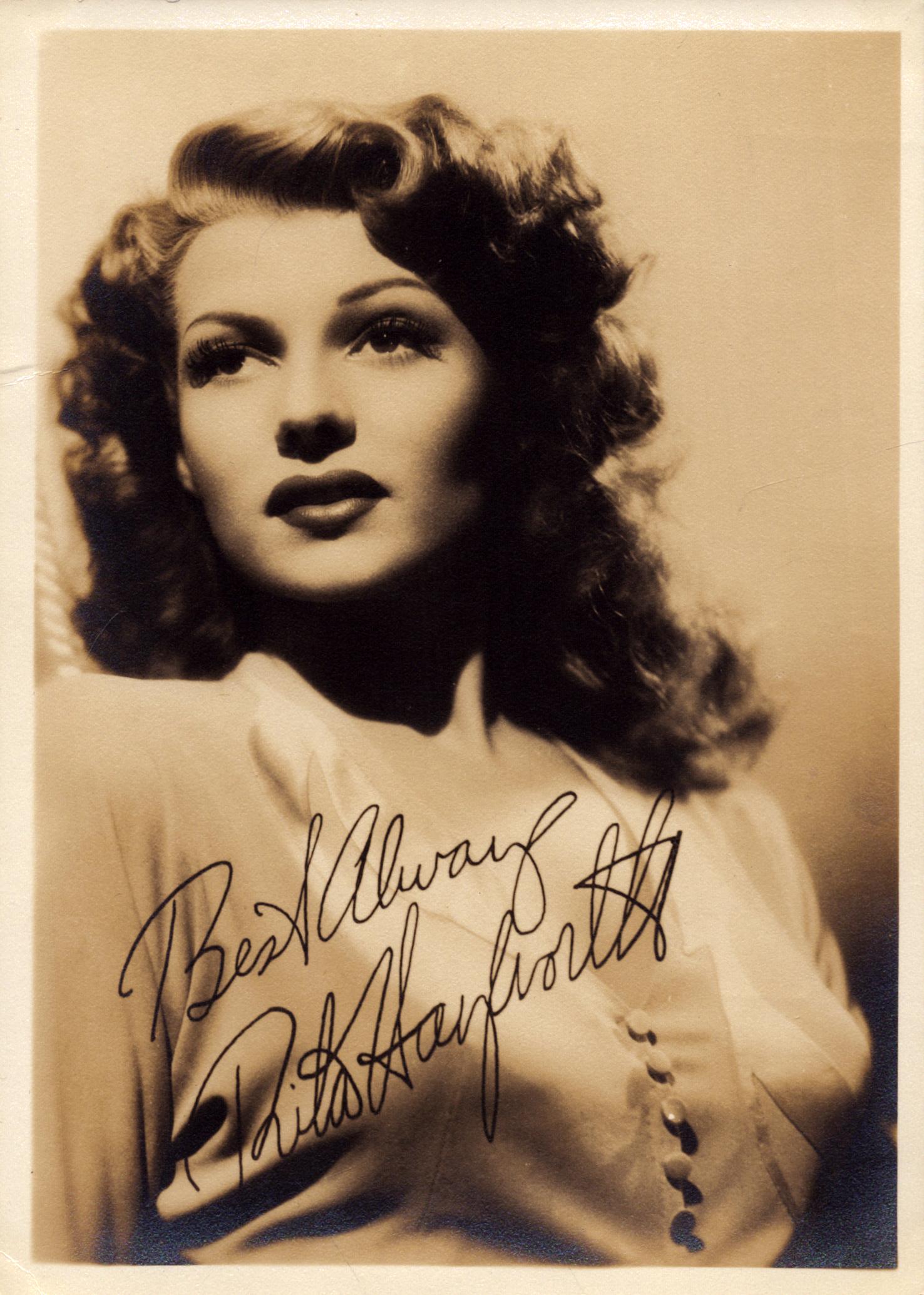 Rita Hayworth signed 7x5 inch vintage sepia photo. Good Condition. All autographs come with a