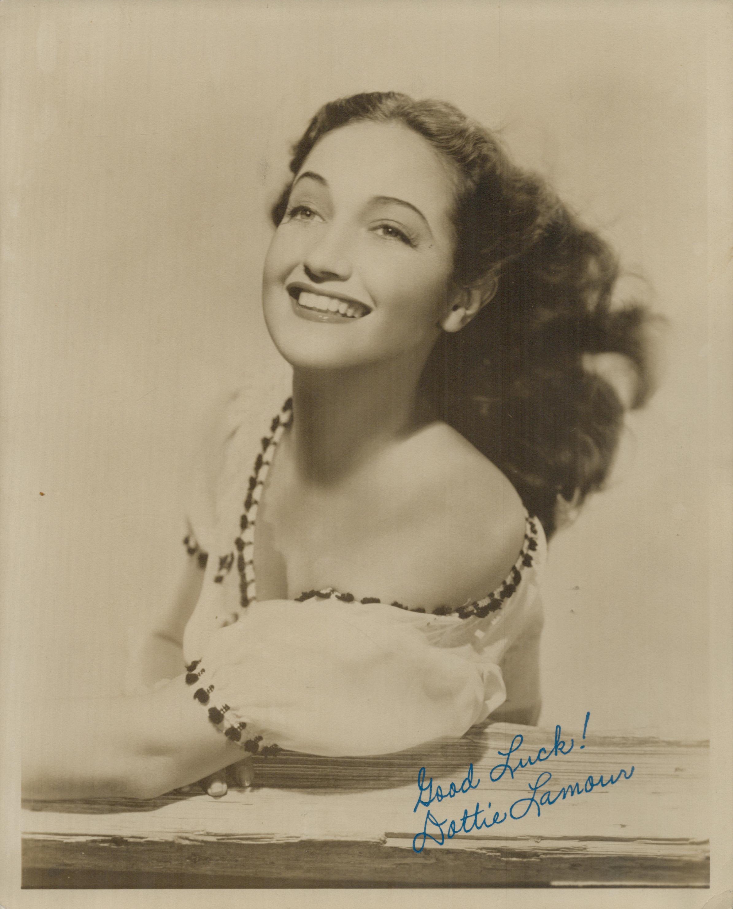 Dorothy Lamour signed 10x8 inch Sepia vintage photo. Good Condition. All autographs come with a